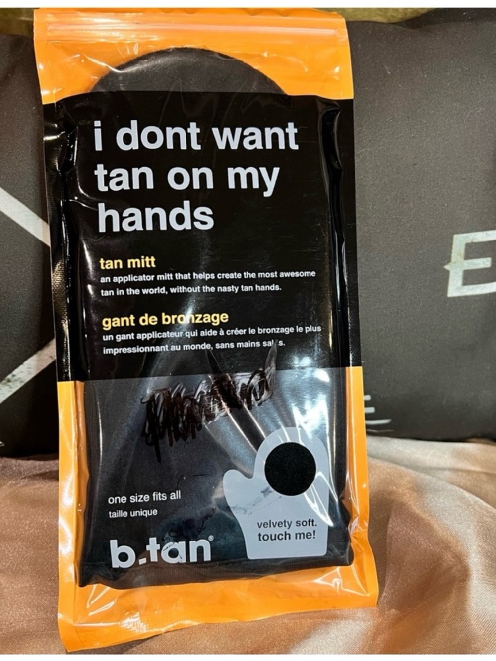 Two b. tan Tan Mitt Applicators